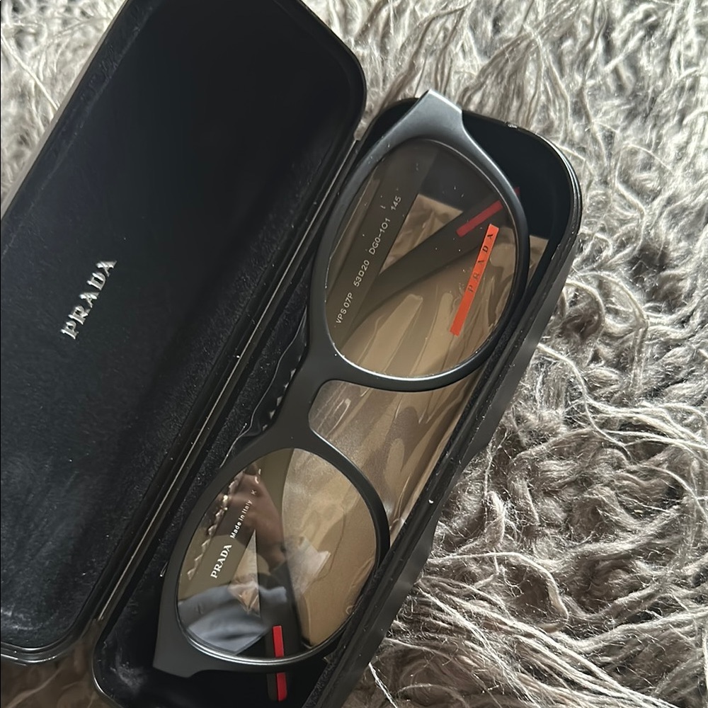 Prada Glasses.